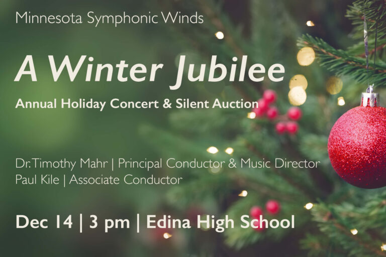 This image is a horizontal rectangle with a medium green background. The right half of the image is a close up of a section of a Christmas tree decorated with lit clear lights. About a vertical foot of the tree is visible on the outer edge of the tree, and only the closest branches are in focus. A textured red bulb ornament is hanging from a branch, with small coordinating red berries blurred in the background. On the left half of the image is off-white text: Minnesota Symphonic Winds A Winter Jubilee Annual Holiday Concert & Silent Auction Dr. Timothy Mahr | Principal Conductor Paul Kile | Associate Conductor Dec 14 | 3 pm | Edina High School